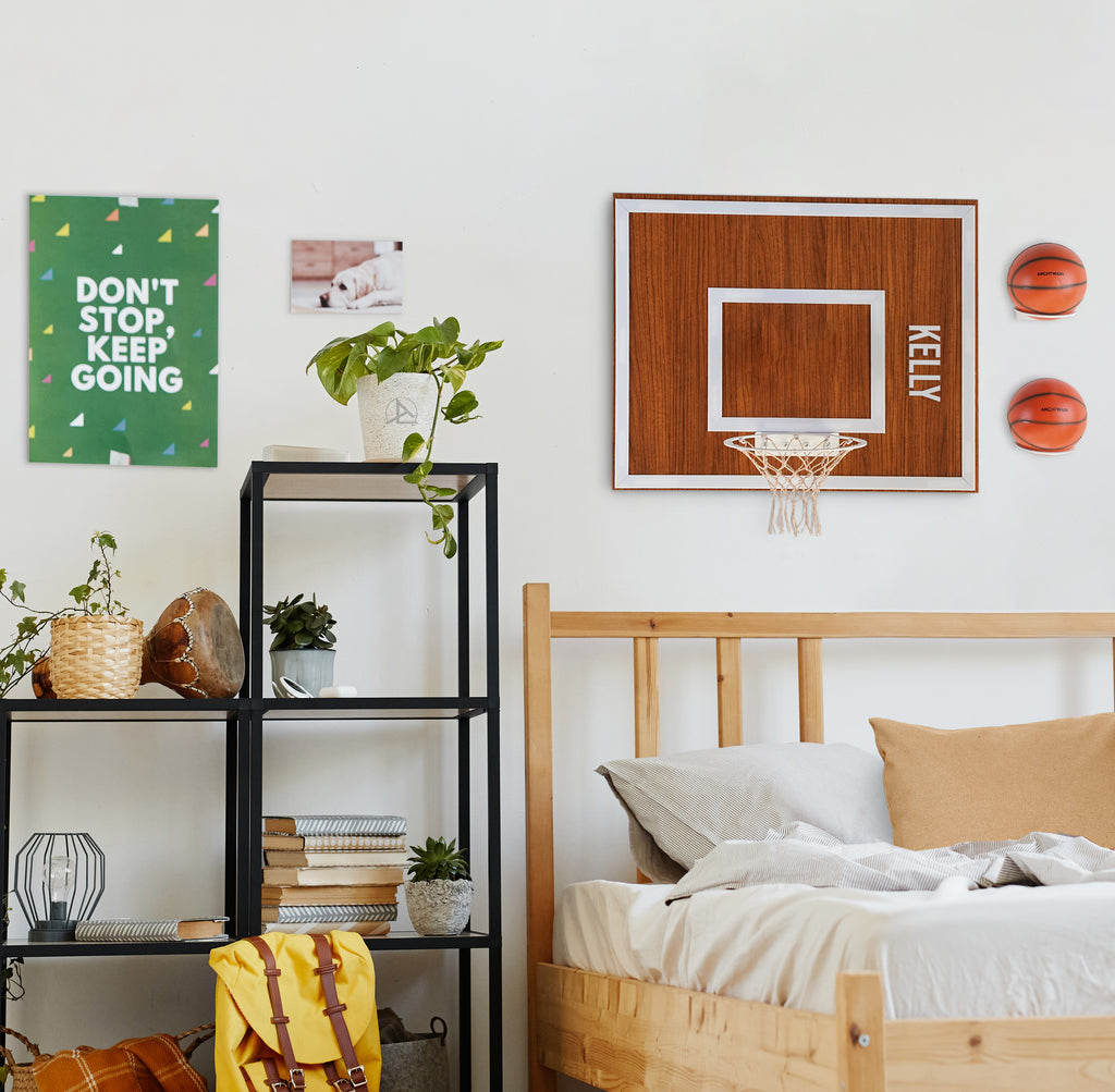 Personalization Wooden Single Hoop in walnut with wall decor and a cozy bedroom setting.